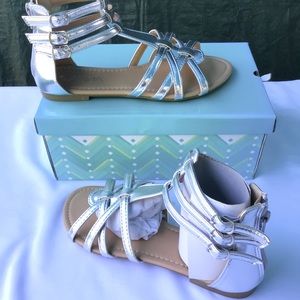 Gladiator sandals silver in color size 6
